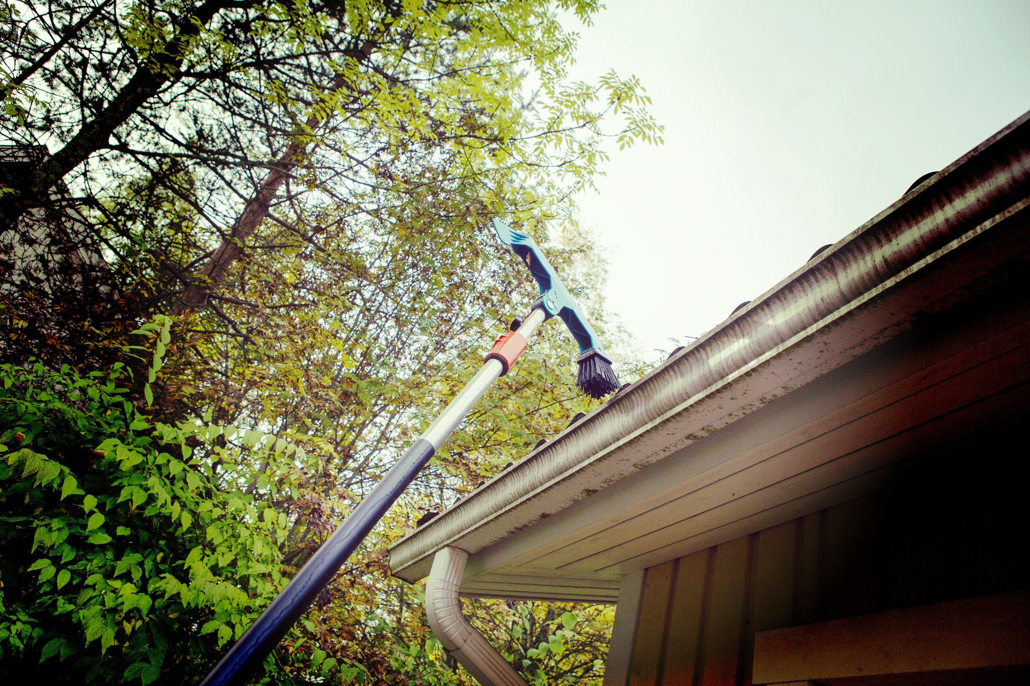 How Clean Gutters Extend the Lifespan of a New Roof Replacement